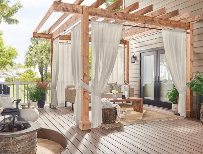 A modern retractable awning installed by Runika.pro over a Miami patio, providing adjustable shade and sun protection for outdoor living