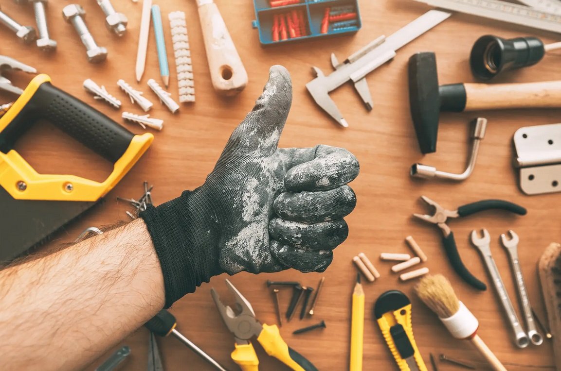 Custom Carpentry & Woodworking Services Miami | Precision Craftsmanship A master carpenter from Runika.pro in Miami meticulously crafting a custom wooden element, showcasing expert joinery and attention to detail