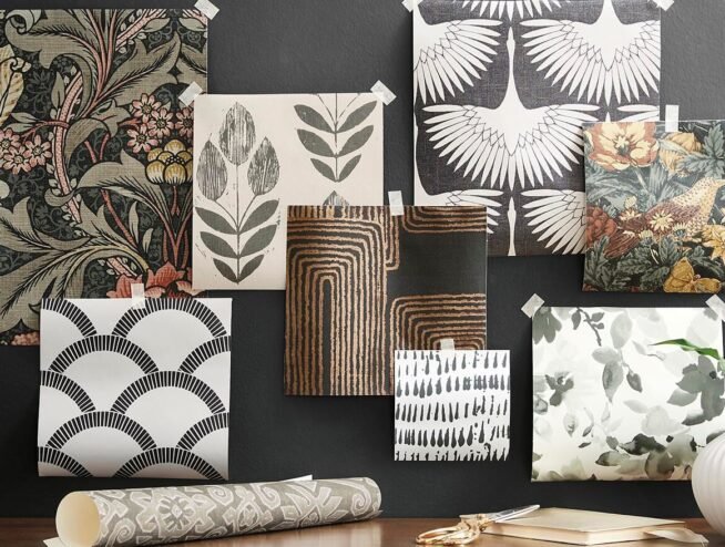 A design consultant from Runika.pro in Miami helps a client choose a wallpaper pattern, alongside a craftsman expertly hanging a seamless strip