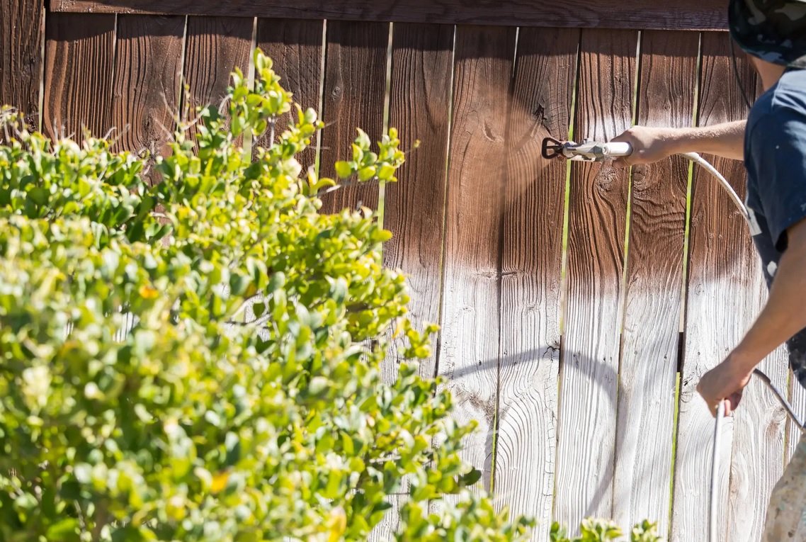 Expert Fence Painting & Staining Miami | Restore & Protect Your Property Professional fence painting service by Runika.pro in Miami, applying a fresh, weather-resistant coat to revitalize and protect a wooden fence